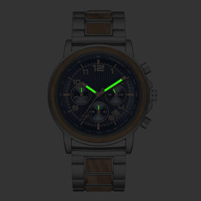 Luminous effect at dark of the silver and olive men watch