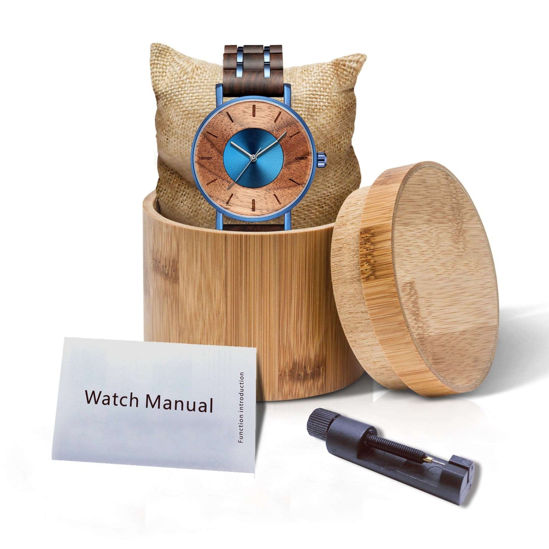 A blue metal case and walnut strap watch packed up with bamboo box
